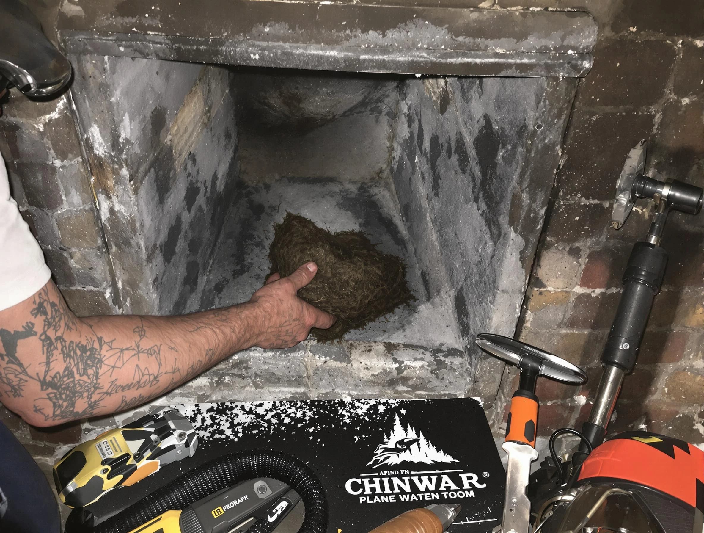 Carnegie Chimney Sweep safely removing debris and screening chimney in Carnegie, PA