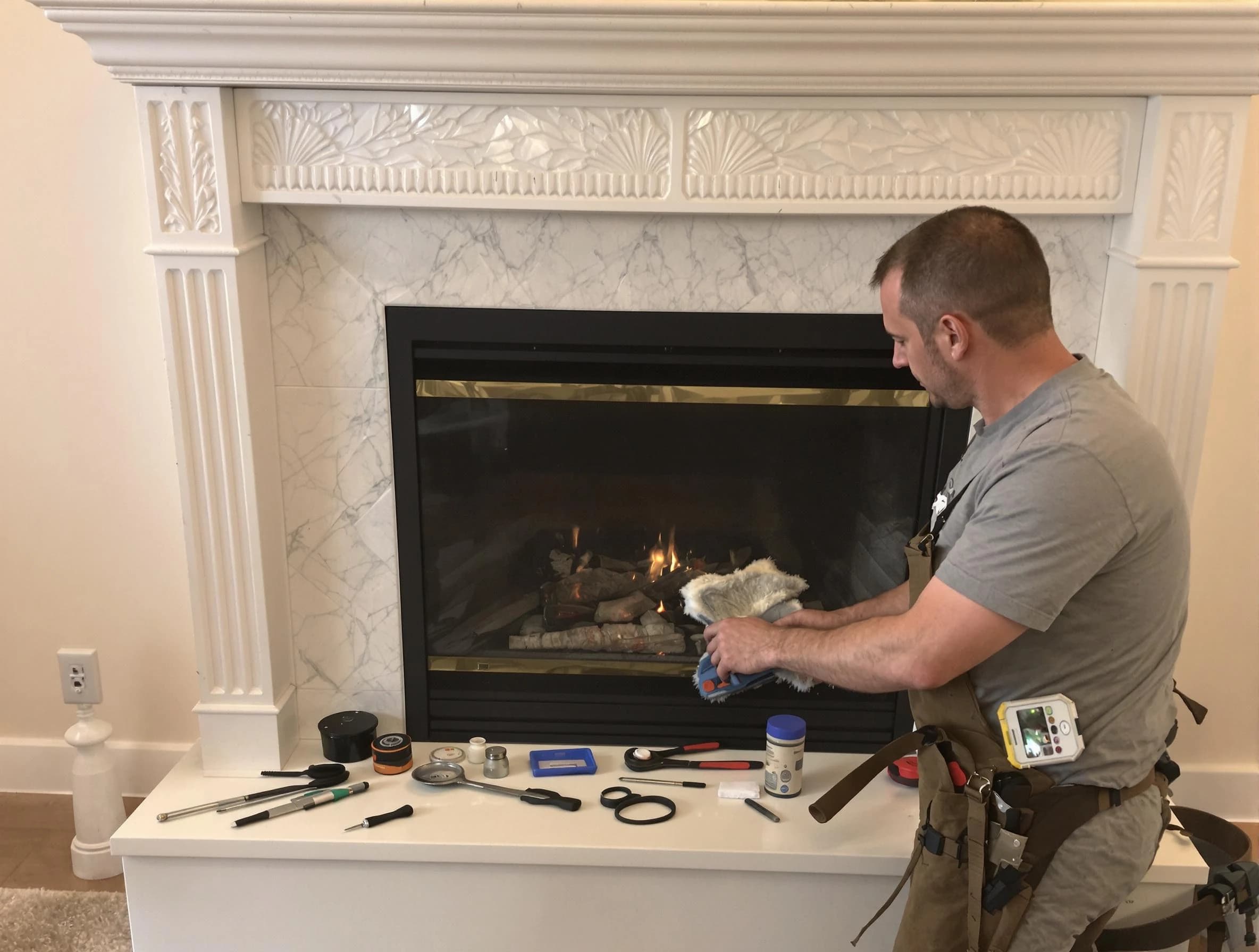 Carnegie Chimney Sweep performing fireplace maintenance in Carnegie, PA